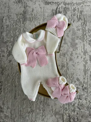 Beautiful knitted Merino Wool Ivory/White Baby Girl Romper with Bow details.